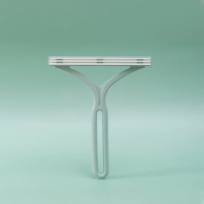 Portable Lint Remover and Pet Hair Brush for Efficient Fabric and Upholstery Cleaning